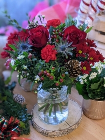 Mixed Christmas Flower Bouquet with Red Roses and Thistle Available for local delivery in Cheadle and Stockport